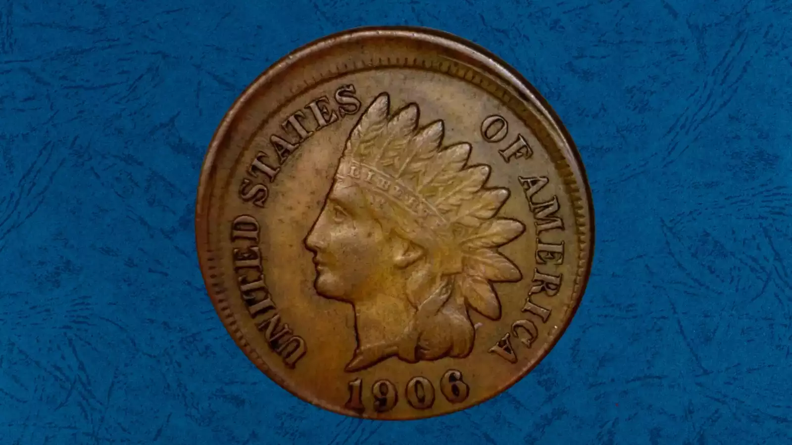 1906 Indian Head penny off-center strike error with blank planchet area visible and full date still readable